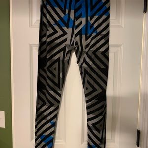 Leggings: Black, gray, and blue geometric shapes